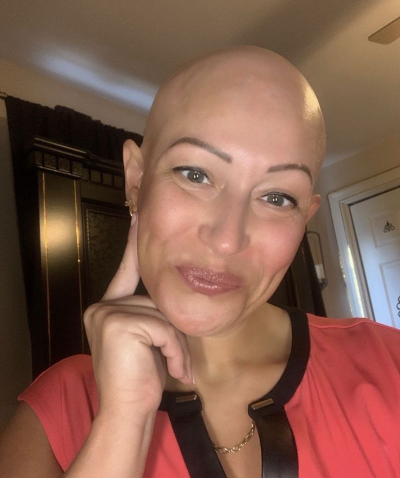 Smiling HEADS client before her wig fitting