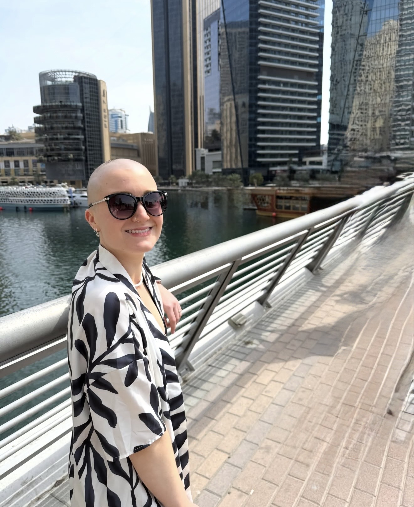 Client living confidently with alopecia, outdoors