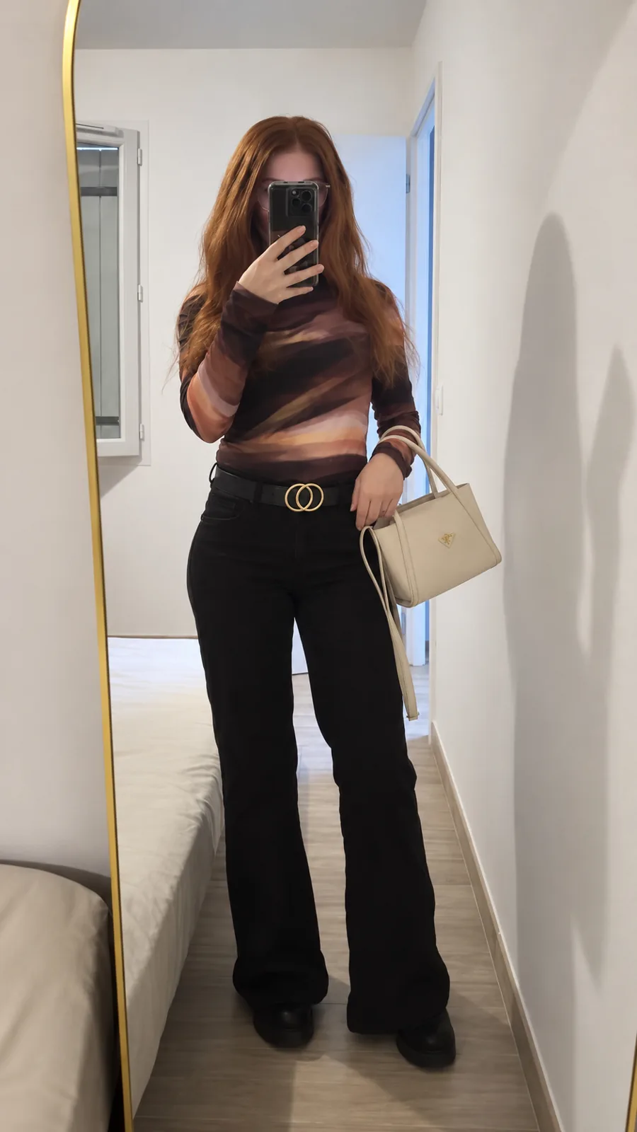 Full-length mirror selfie in a long auburn human-hair wig