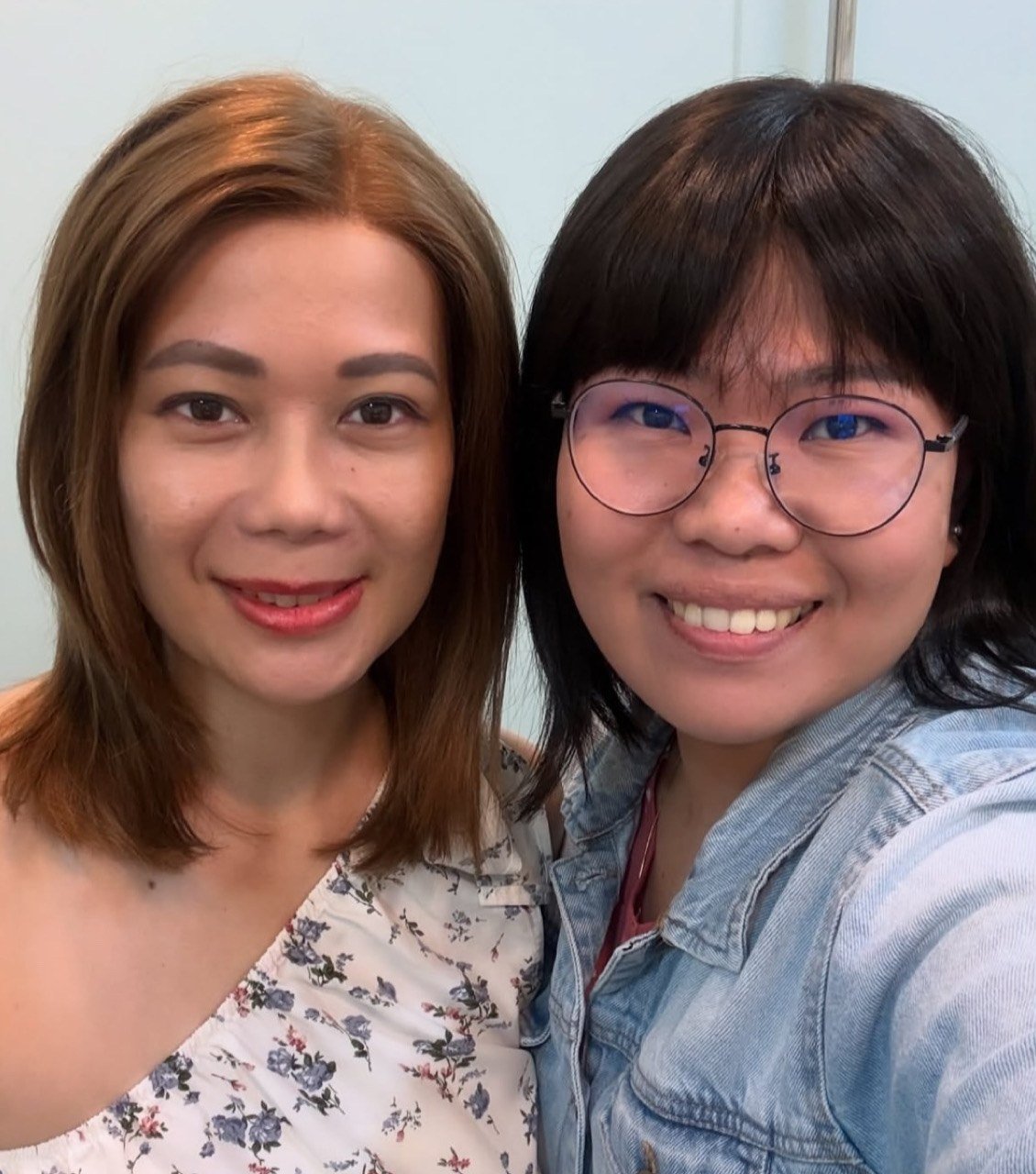 Two friends from the alopecia community in their HEADS wigs