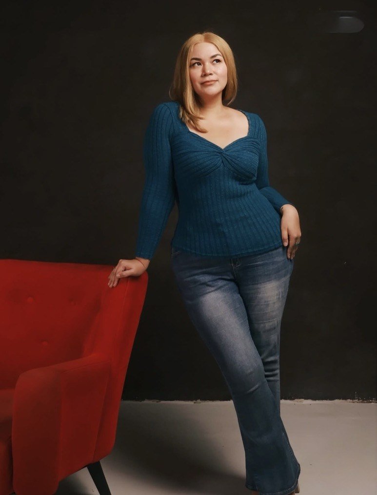 Full-length studio portrait blonde human hair wig